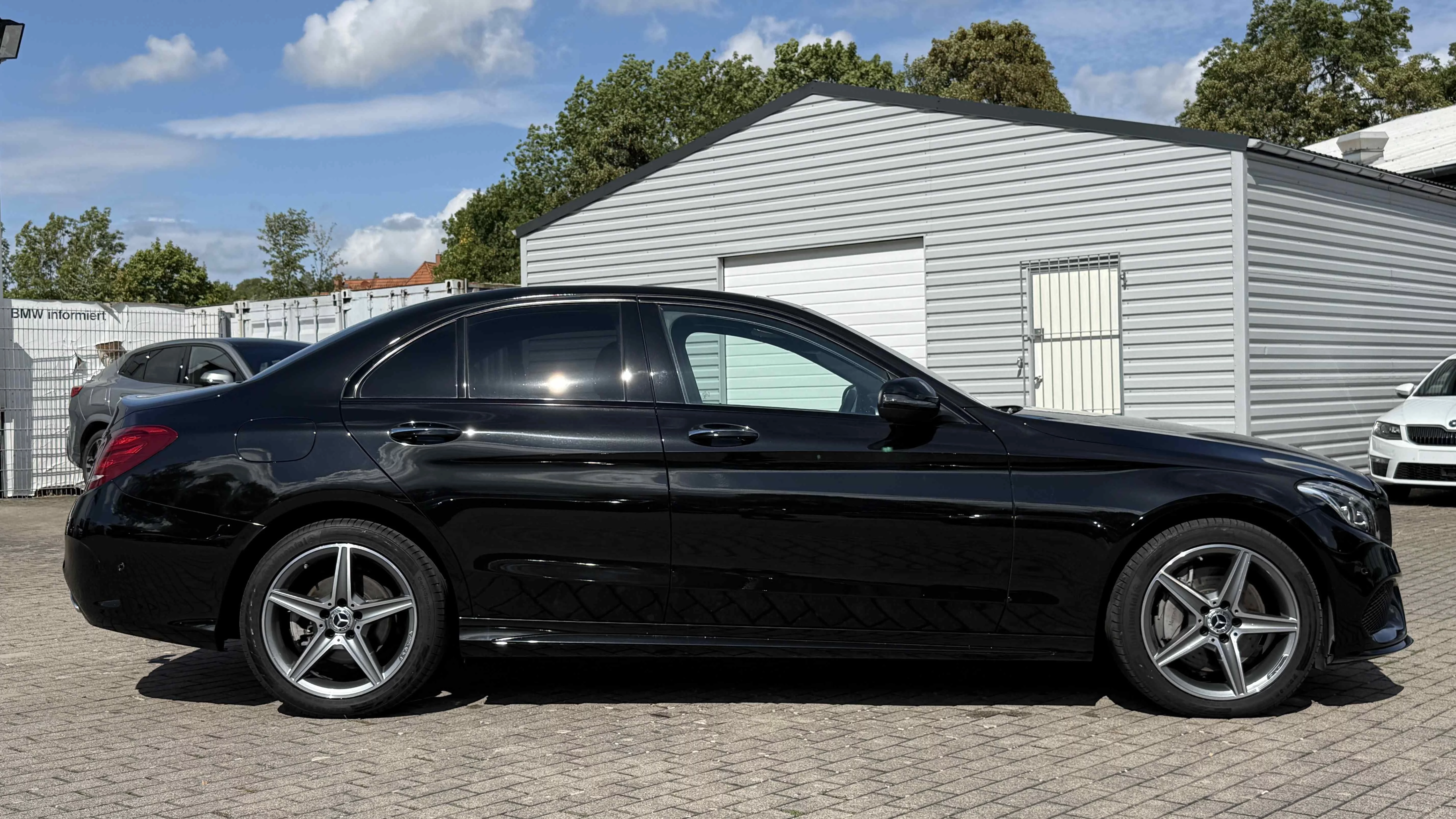 Mercedes C 400 AMG Line 4Matic LED Navi AHK HUD Kamera SHZ PDC Tempo